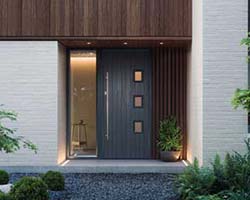 composite front door in grey with a glass side panel
